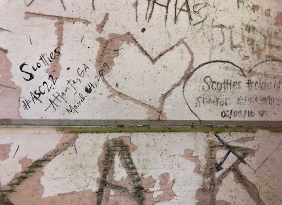 2022 Scotties' signature next to that of Scotties from a previous trip at the top of Mount Peléé  (CC BY-NC-ND 4.0)